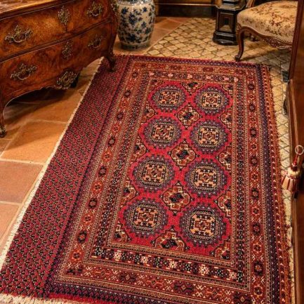 ANTIQUE PERSIAN RUG — GEOMETRY, COLOUR & TRIBAL CHARACTER
